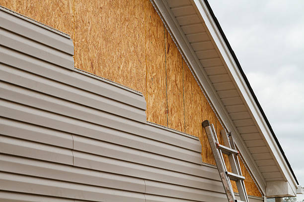 Professional Emergency Siding Repair technician working in Monroe Township, NJ